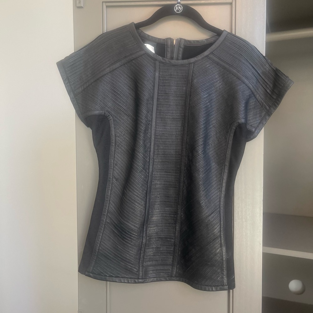 leather top w partial exposed back zipper with jersey back for better fit